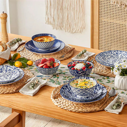 Selene porcelain cereal bowls set of 4 blue and white Japanese inspired floral pattern mix and match tableware styled with fruits and dishes on dining table