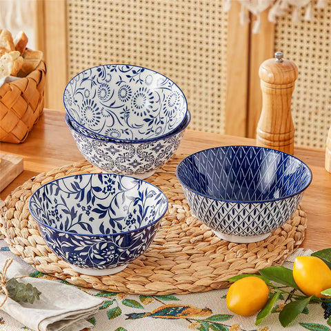 Selene porcelain cereal bowls set of 4 blue and white Japanese inspired floral pattern mix and match tableware styled with fruits and dishes on dining table