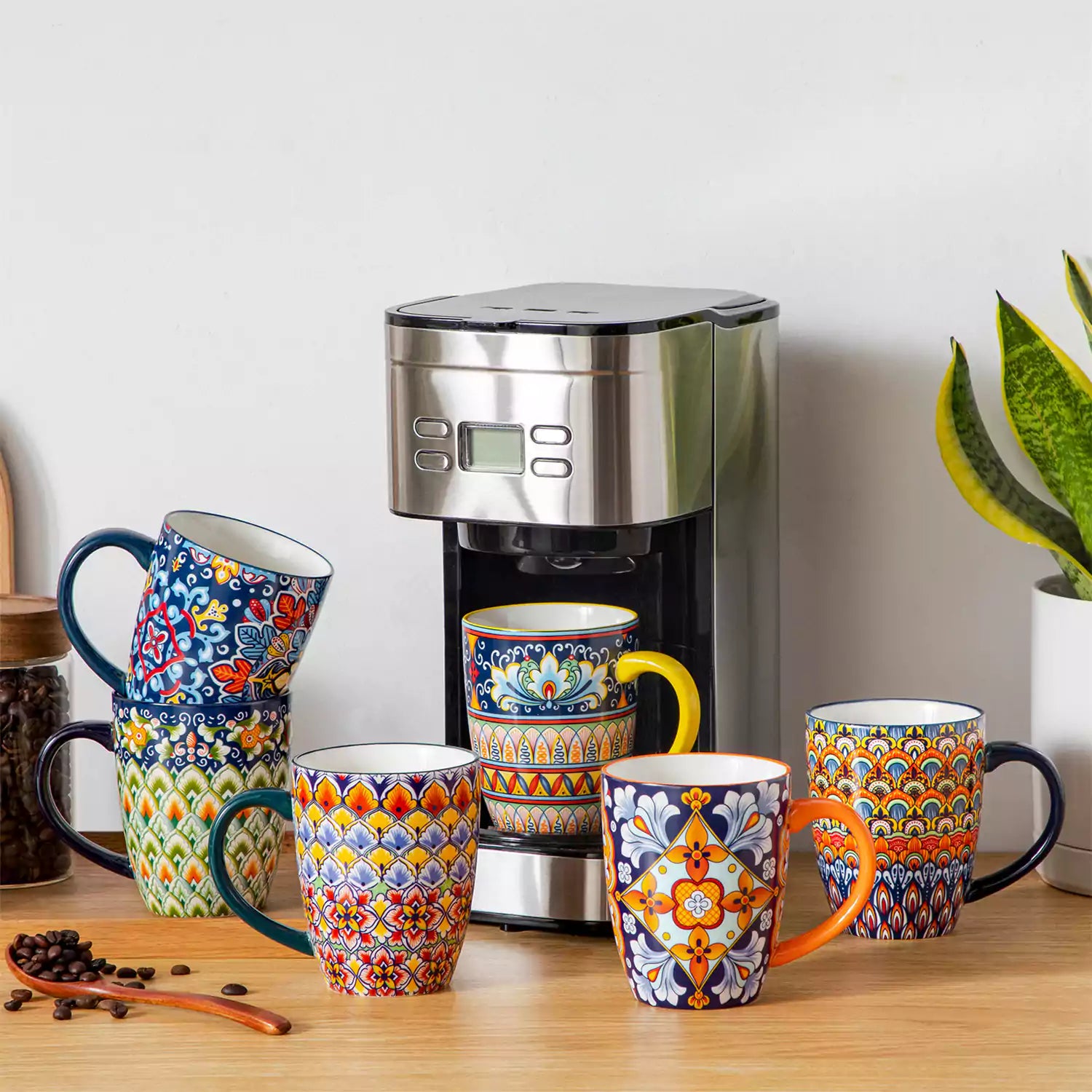 Boho-style coffee mugs filled with creamy latte, colorful porcelain set for cozy mornings