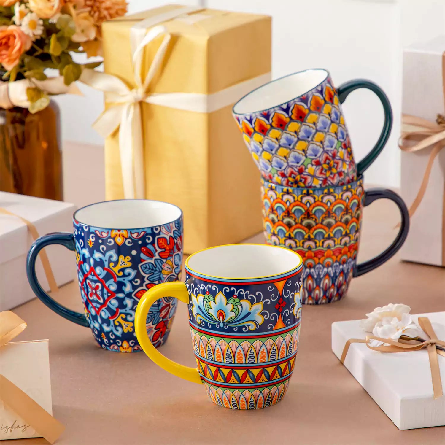 Boho-style coffee mugs filled with creamy latte, colorful porcelain set for cozy mornings