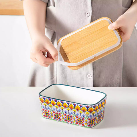 Forest green porcelain butter dish with wooden lid in boho chic style - perfect for a colorful breakfast table with bread and coffee-vancasso