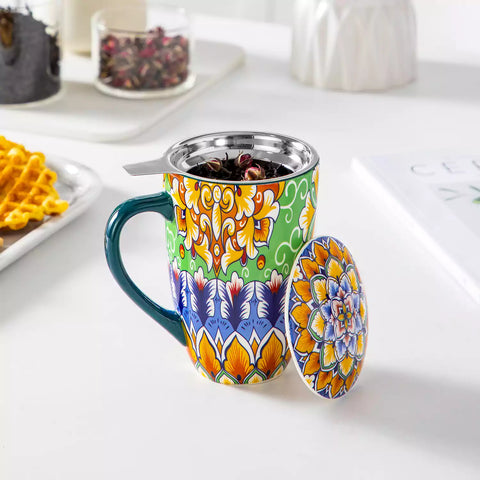 Simi tea mug with infuser and lid colorful hunter green boho chic ceramic coffee cup with spoon and loose tea leaves on white background 