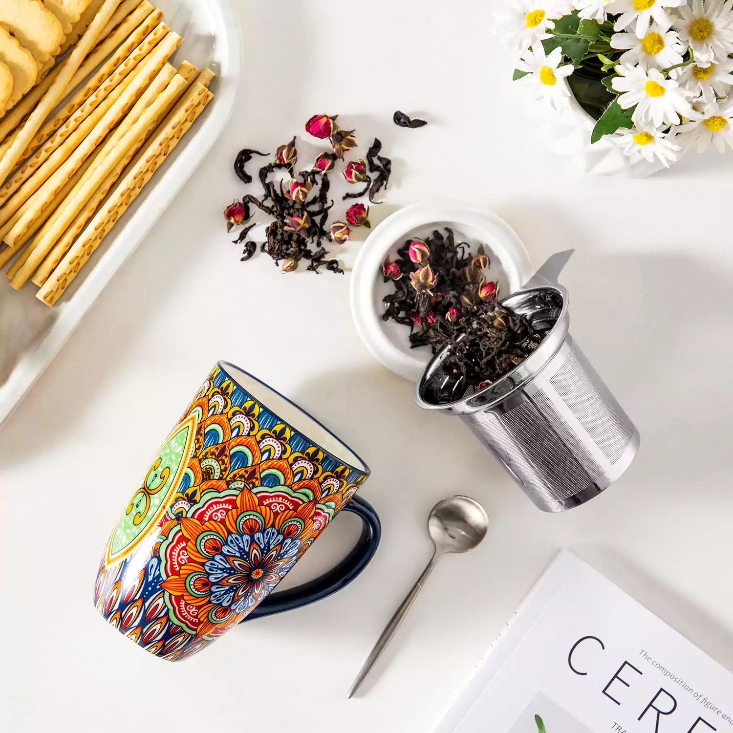 Simi tea mug with infuser and lid colorful forest green boho chic ceramic coffee cup with spoon and loose tea leaves on white background 