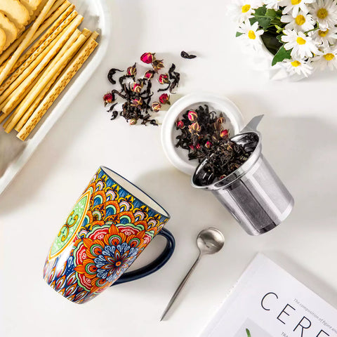 Simi tea mug with infuser and lid colorful forest green boho chic ceramic coffee cup with spoon and loose tea leaves on white background 