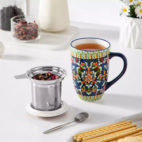Simi tea mug with infuser and lid colorful midnight blue boho chic ceramic coffee cup with spoon and loose tea leaves on white background