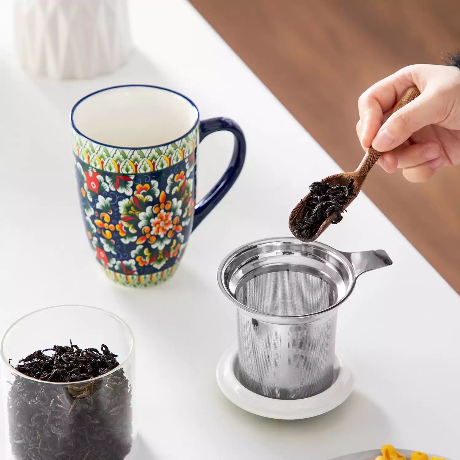 Simi tea mug with infuser and lid colorful midnight blue boho chic ceramic coffee cup with spoon and loose tea leaves on white background