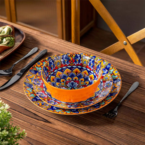 Bohemian-style 12-piece porcelain dinnerware set with front-only floral and geometric patterns in bold orange - modern and artistic table setting