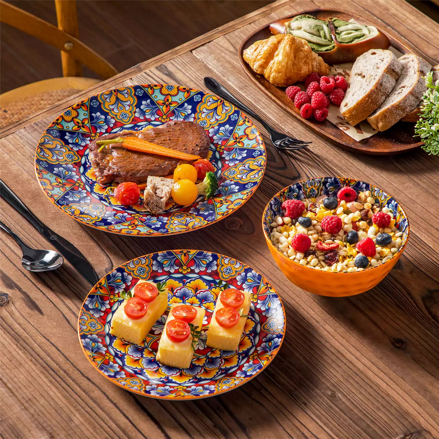 Bohemian-style 12-piece porcelain dinnerware set with front-only floral and geometric patterns in bold orange - modern and artistic table setting