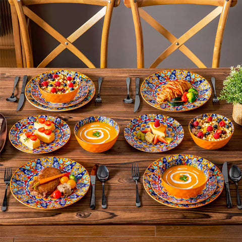 Bohemian-style 12-piece porcelain dinnerware set with front-only floral and geometric patterns in bold orange - modern and artistic table setting