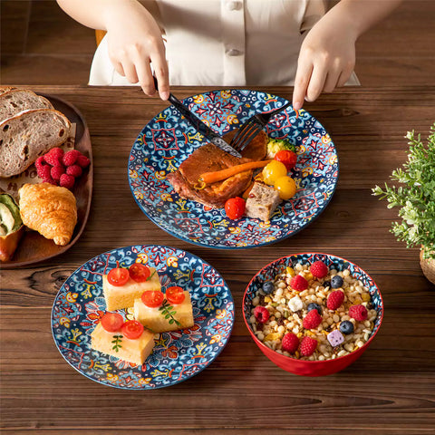 Bohemian-style 12-piece porcelain dinnerware set with front-only floral and geometric patterns in vivid red - modern and artistic table setting