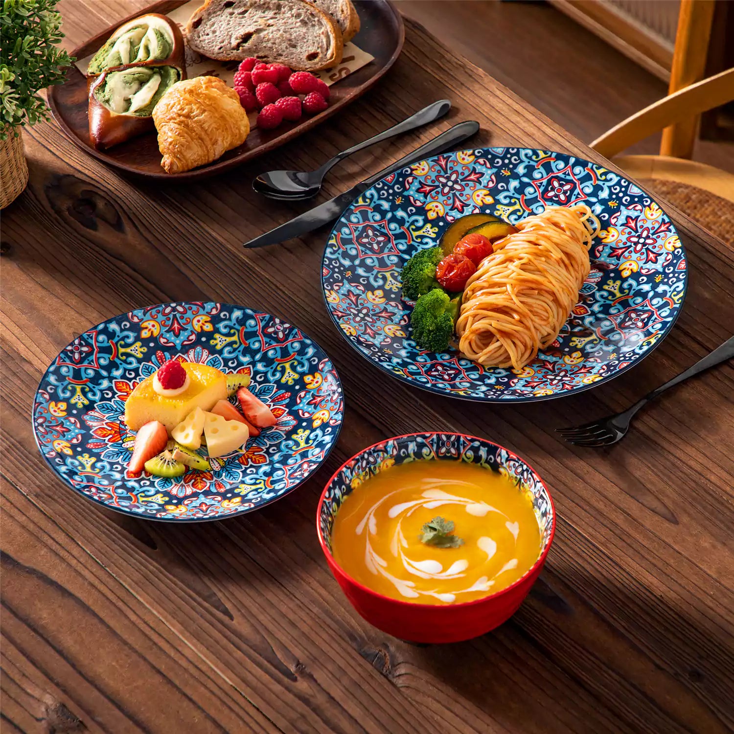 Bohemian-style 12-piece porcelain dinnerware set with front-only floral and geometric patterns in vivid red - modern and artistic table setting