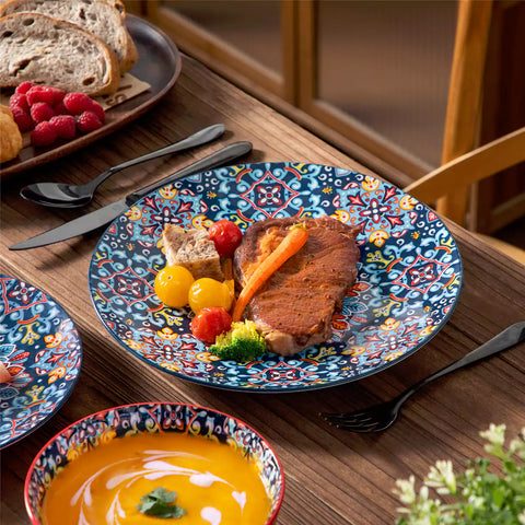 Bohemian-style 12-piece porcelain dinnerware set with front-only floral and geometric patterns in vivid red - modern and artistic table setting