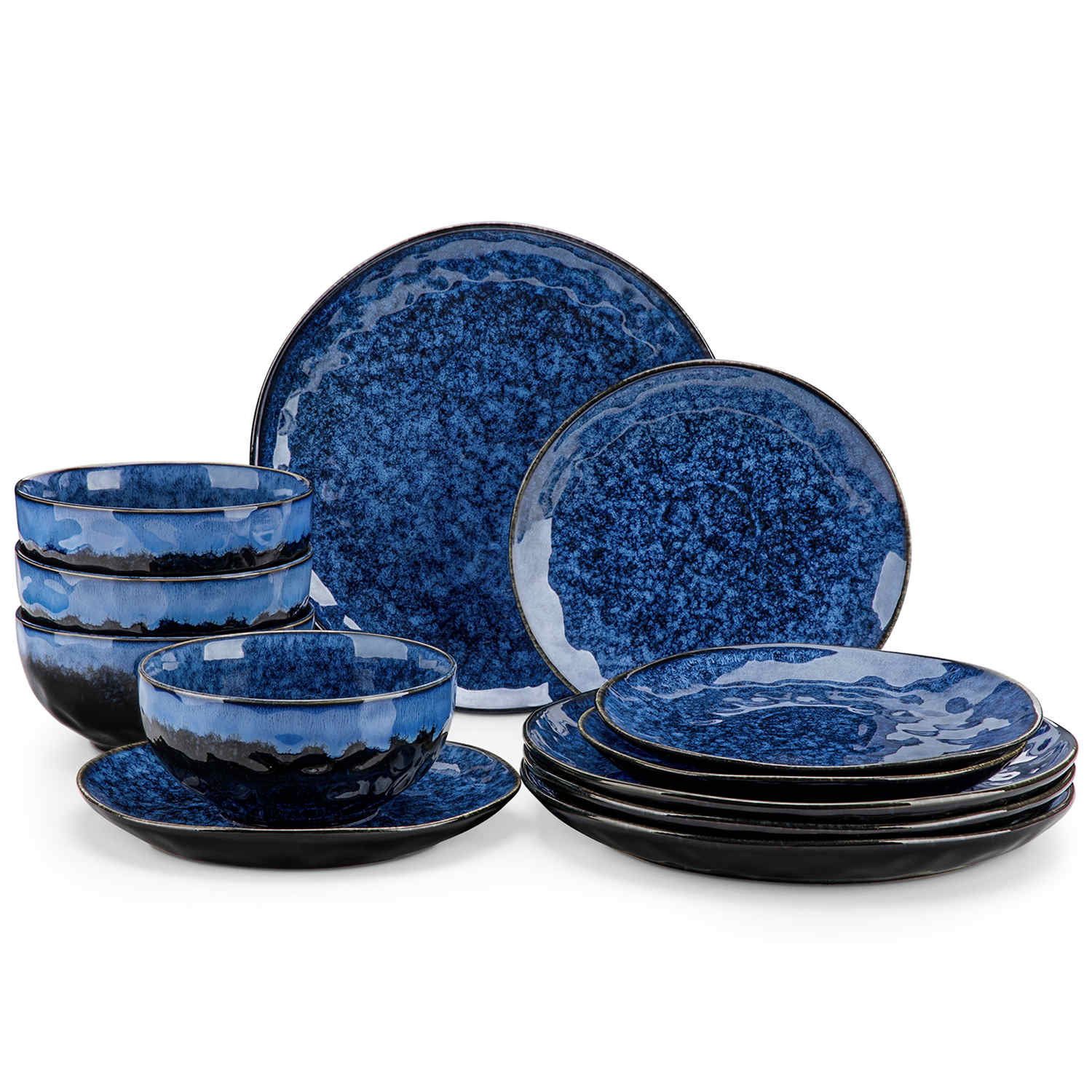 Starry 12-piece stoneware dinnerware set in blue on a light wooden table - styled with lamb chops - pastries - coffee pot - and lemon water for a cozy farmhouse breakfast scene