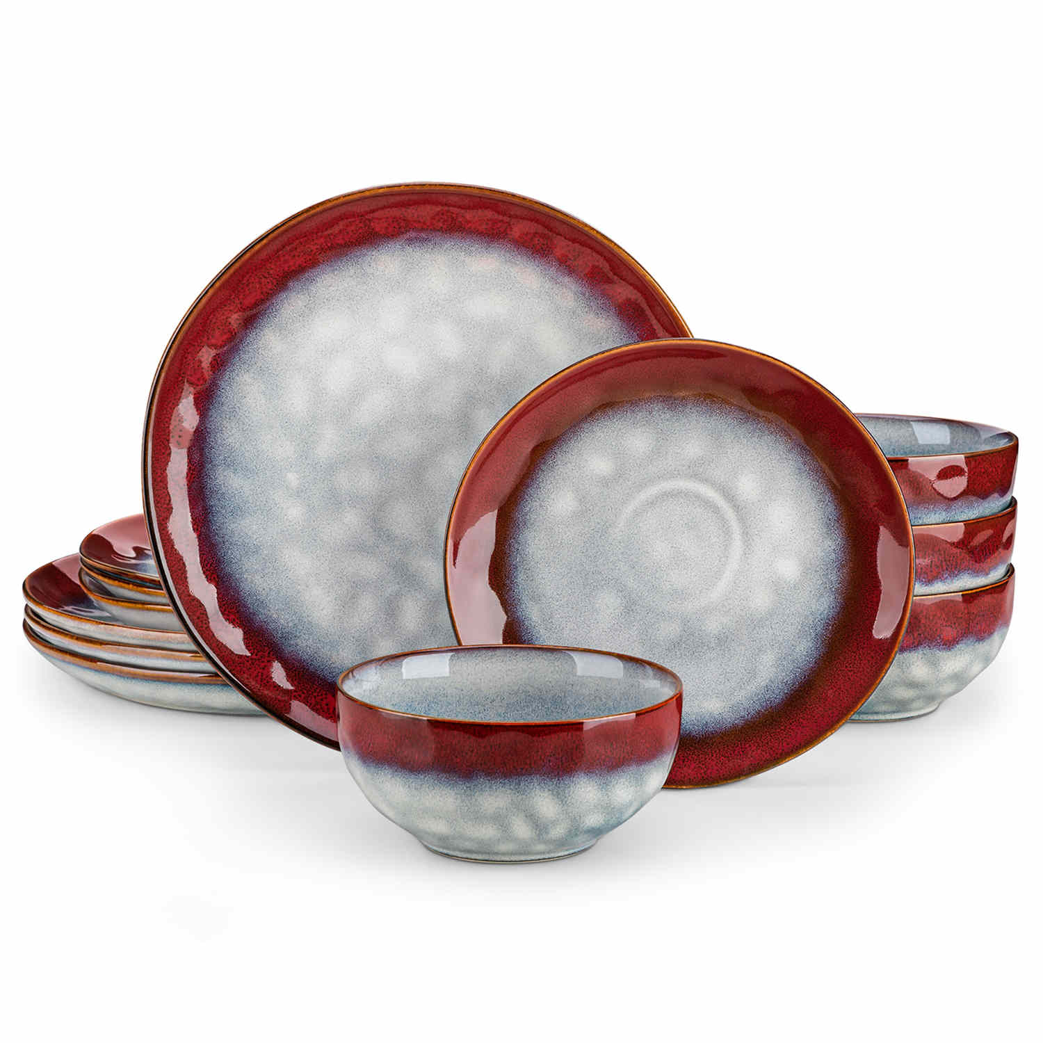 Starry 12-piece stoneware dinnerware set in red on a light wooden table - styled with lamb chops - pastries - coffee pot - and lemon water for a cozy farmhouse breakfast scene