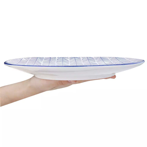 Porcelain dinner plates set of 4 with classic Japanese indigo stripe patterns, featuring assorted designs, ideal for serving steak.